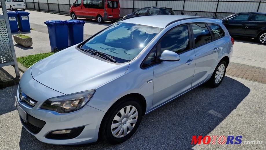 2014' Opel Astra Karavan photo #1