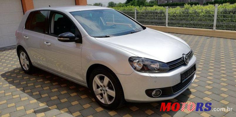 2012' Volkswagen Golf VI 1,6 Tdi photo #2