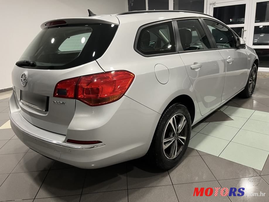 2015' Opel Astra Karavan photo #4