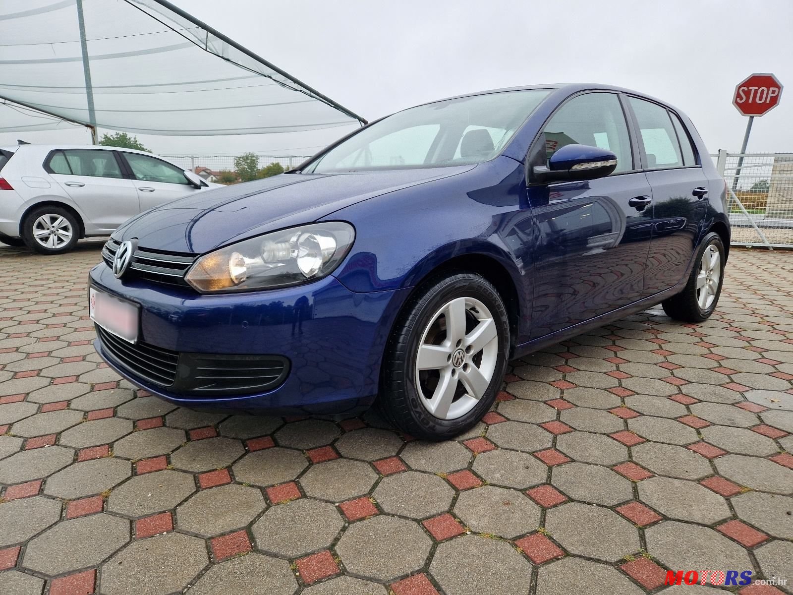 2009' Volkswagen Golf VI 1,6 Tdi photo #3