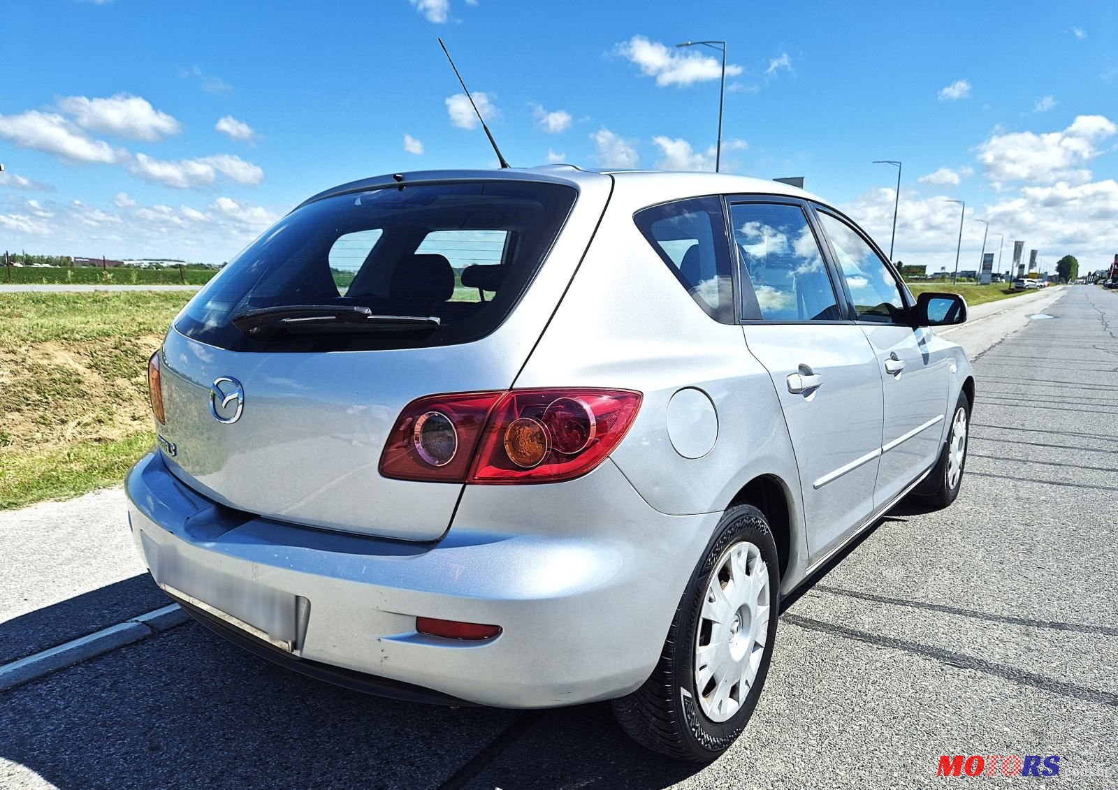 2005' Mazda 3 Sport 1,4 I Ce photo #6