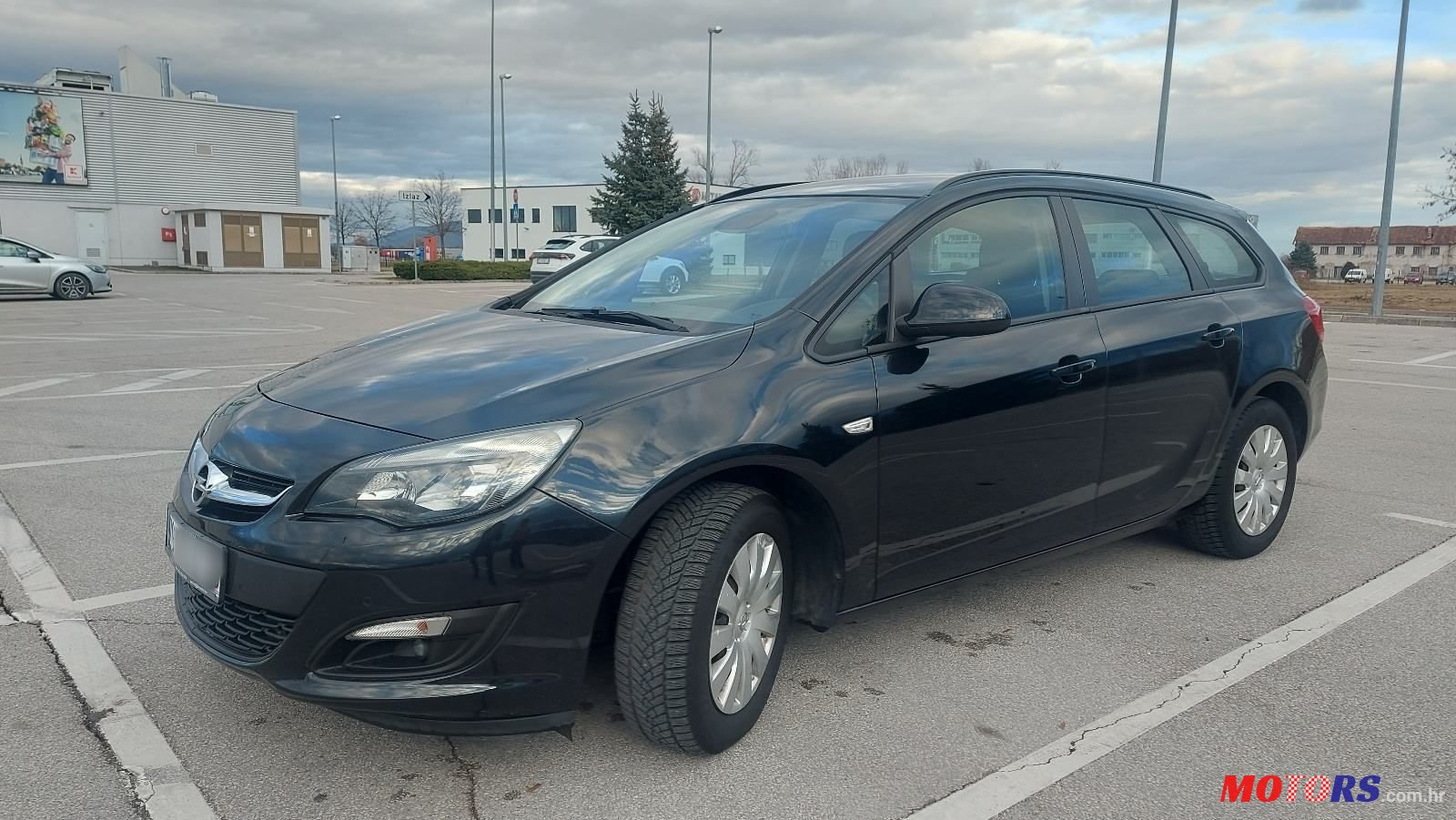 2014' Opel Astra Karavan photo #1