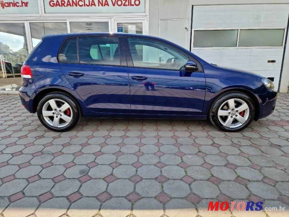 2011' Volkswagen Golf VI 1,6 Tdi photo #4