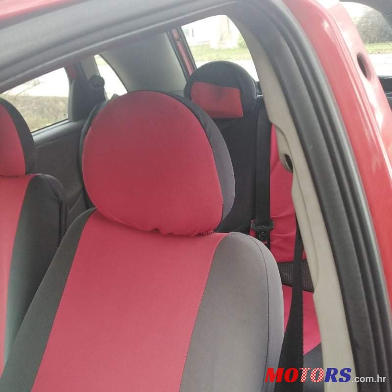 2004' Opel Corsa photo #7