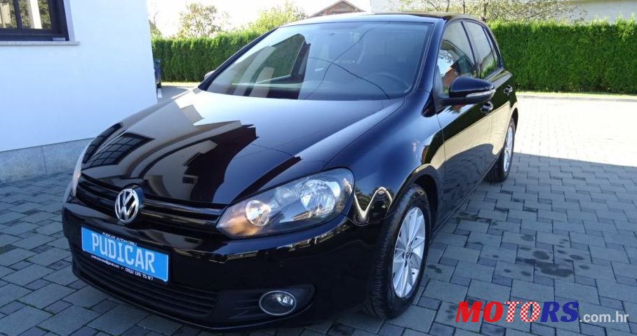 2010' Volkswagen Golf VI 1,6 Tdi photo #1