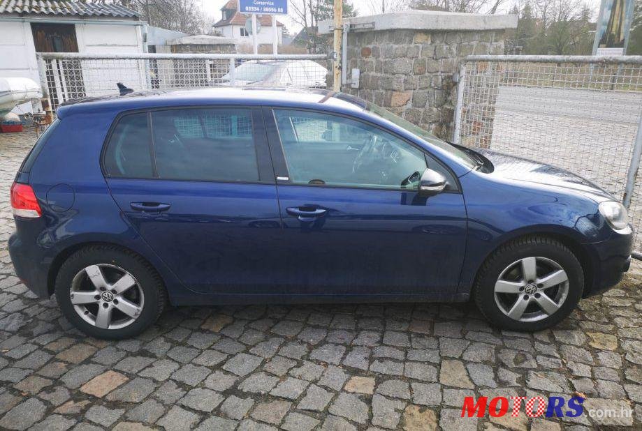 2012' Volkswagen Golf VI 1,6 Tdi photo #1