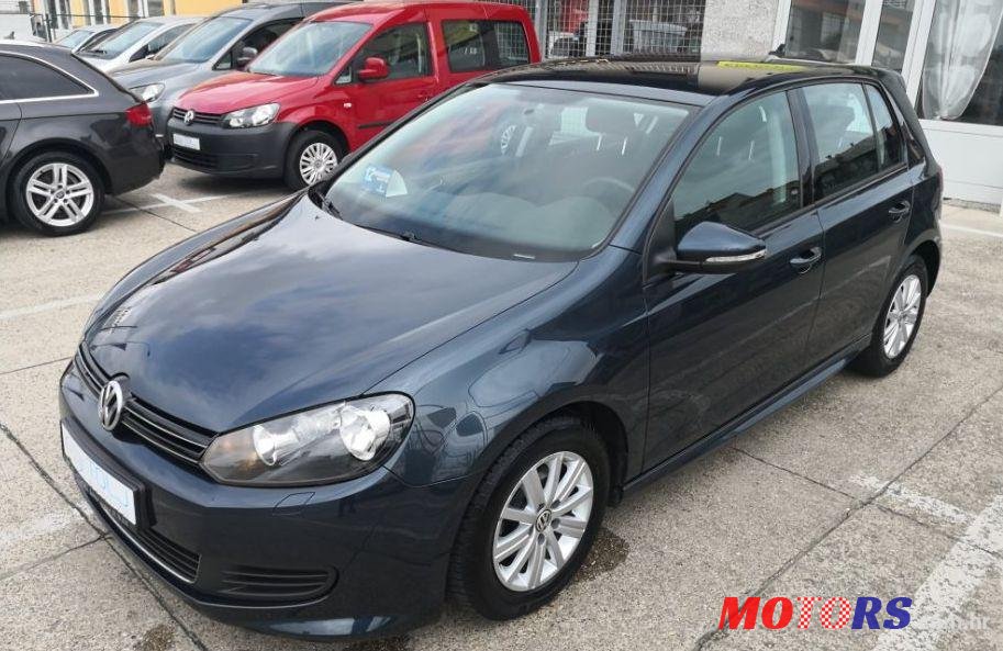 2011' Volkswagen Golf VI 1,6 Tdi photo #1