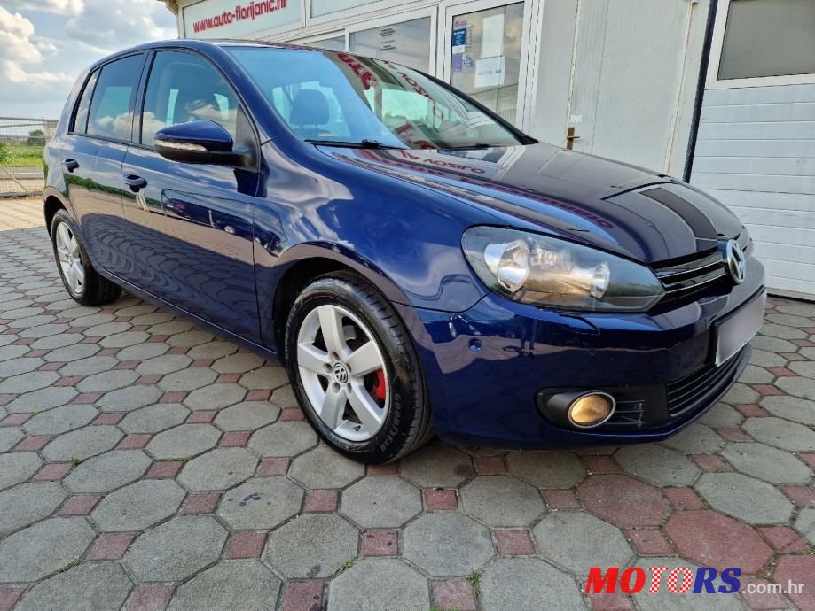 2011' Volkswagen Golf VI 1,6 Tdi photo #3