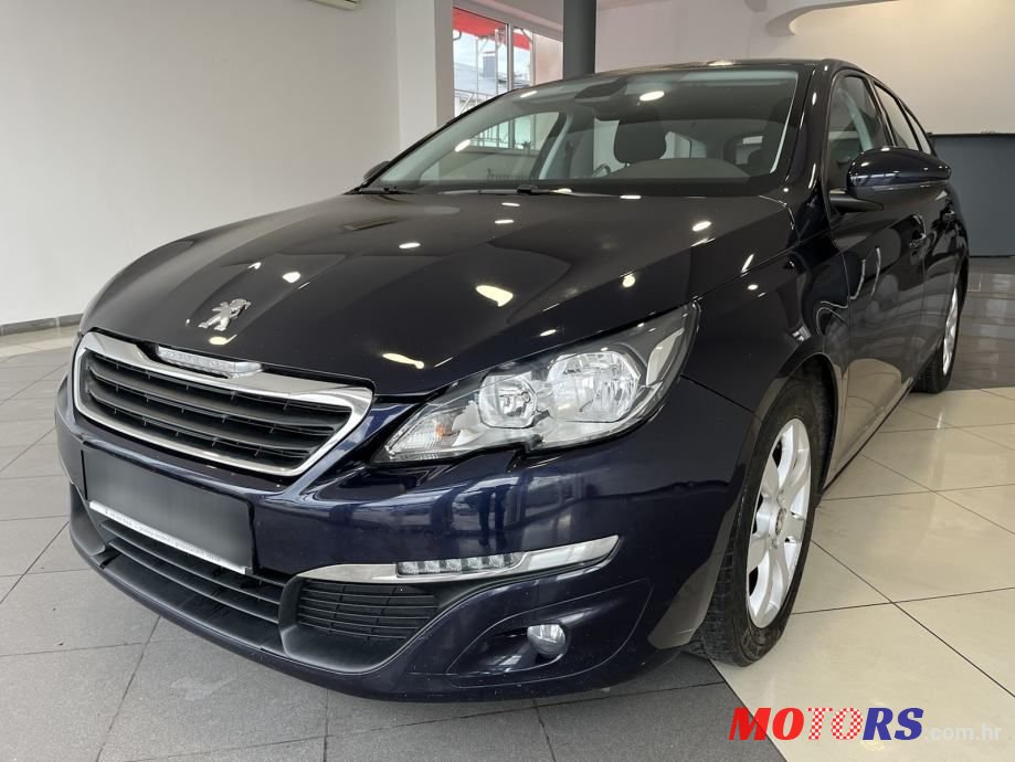 2015' Peugeot 308 Sw photo #1