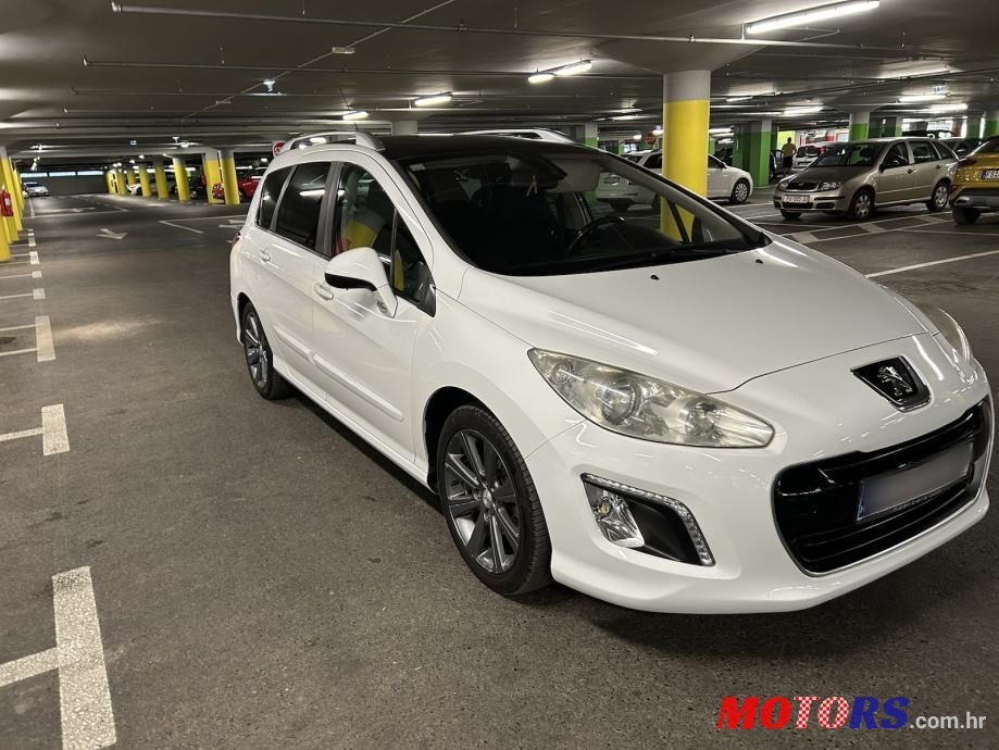 2011' Peugeot 308 Sw photo #6