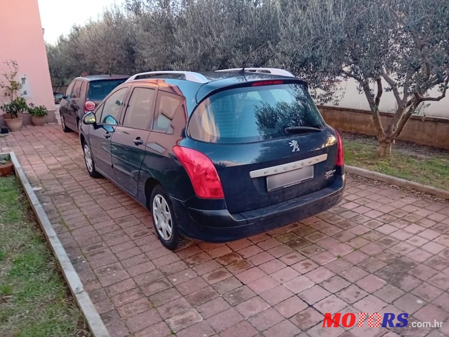 2010' Peugeot 308 Sw photo #1