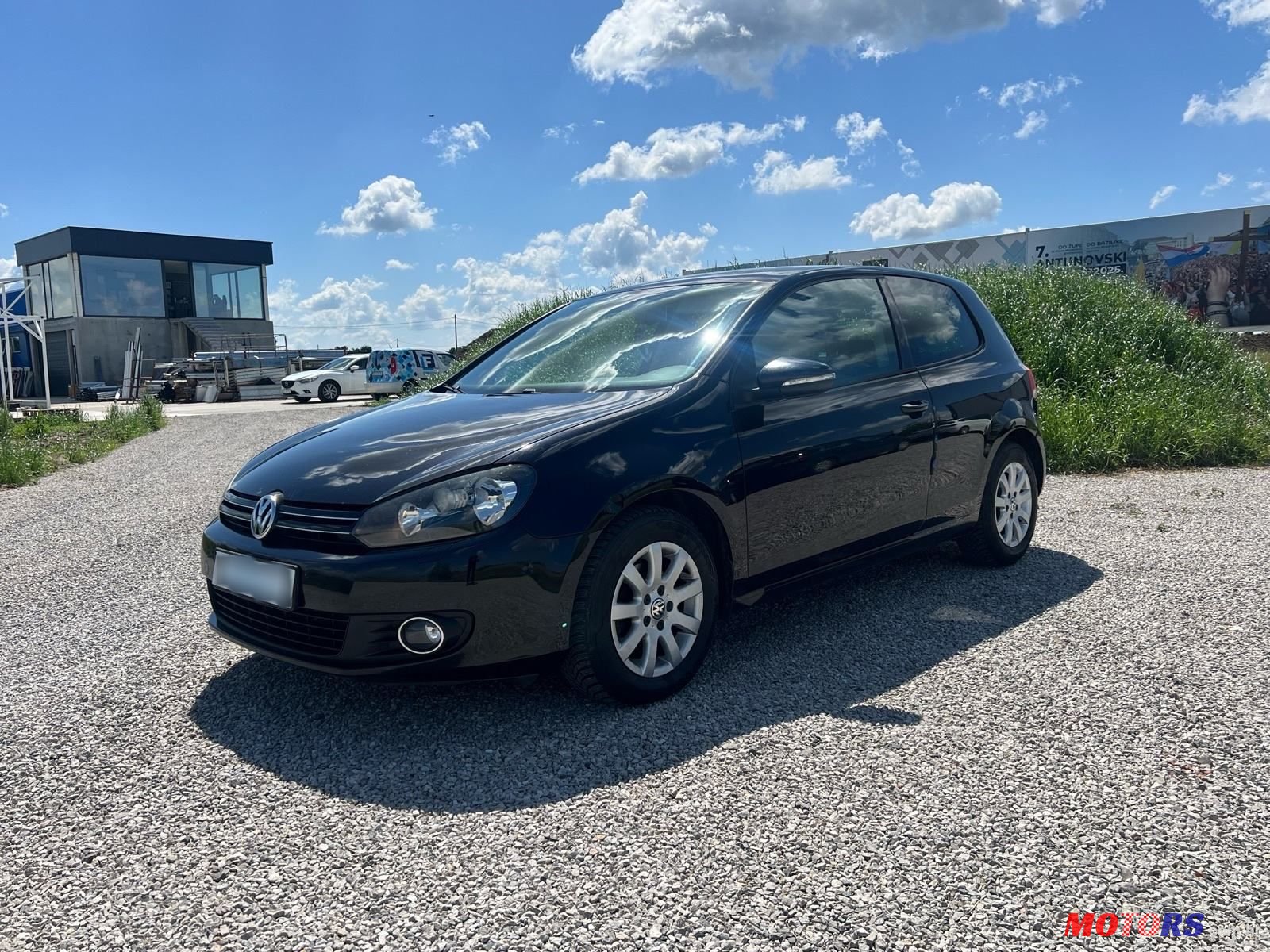 2010' Volkswagen Golf VI 1,6 Tdi photo #1