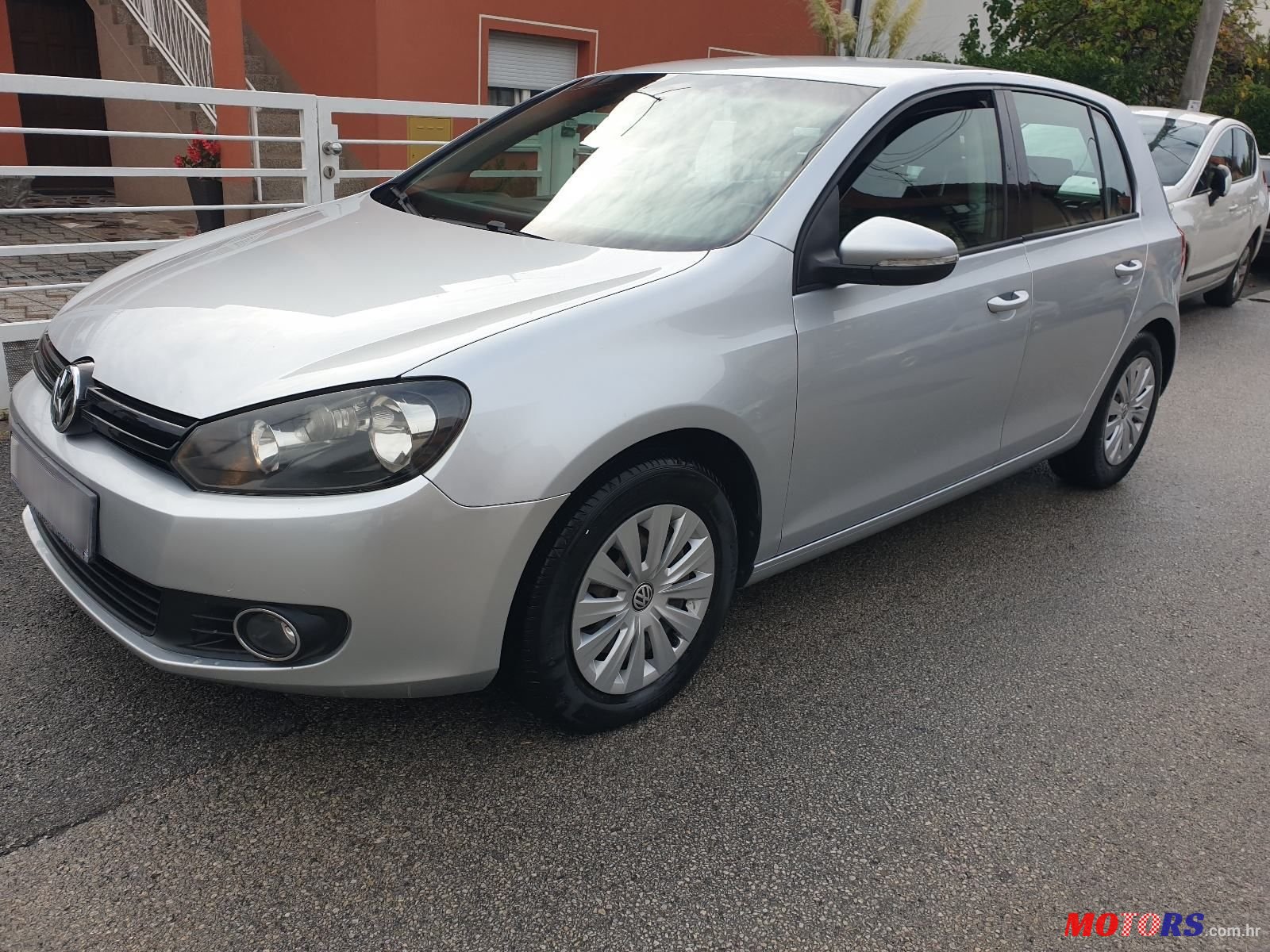 2011' Volkswagen Golf VI 1,6 Tdi photo #1