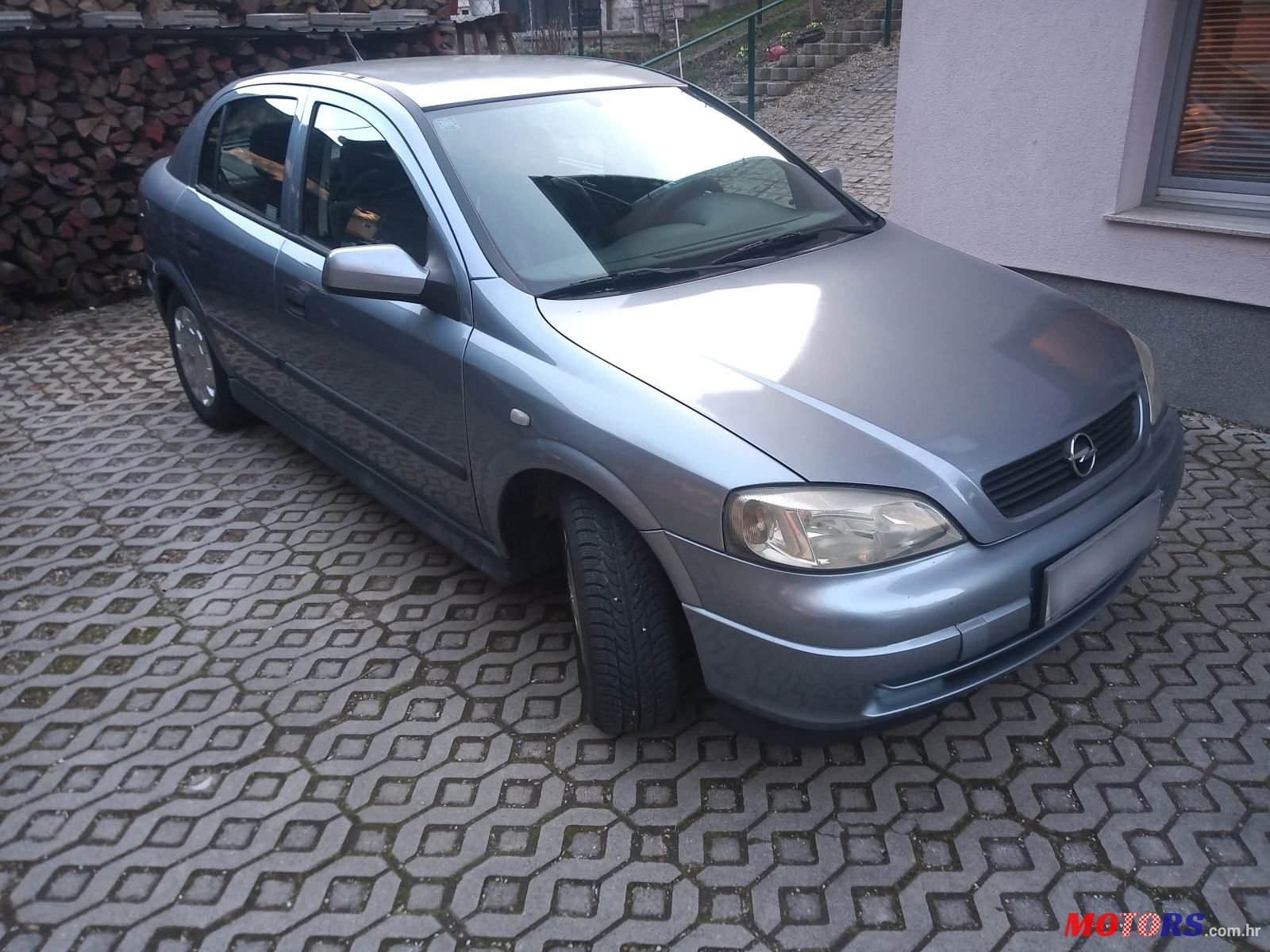 2004' Opel Astra 1,4 photo #1
