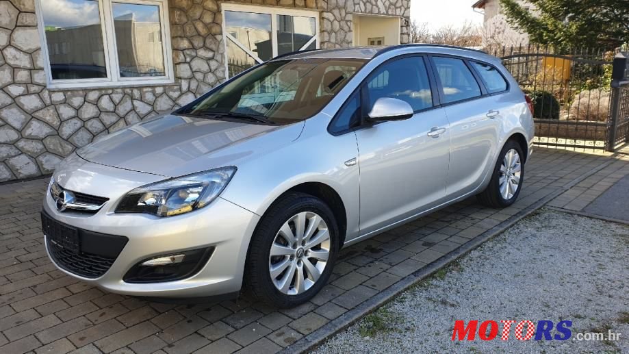 2015' Opel Astra Karavan photo #1