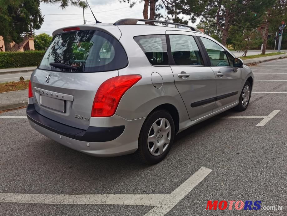 2011' Peugeot 308 Sw photo #5