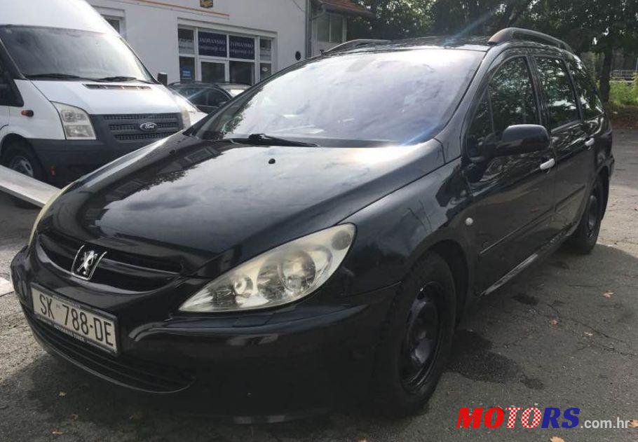 2004' Peugeot 307 Sw photo #1