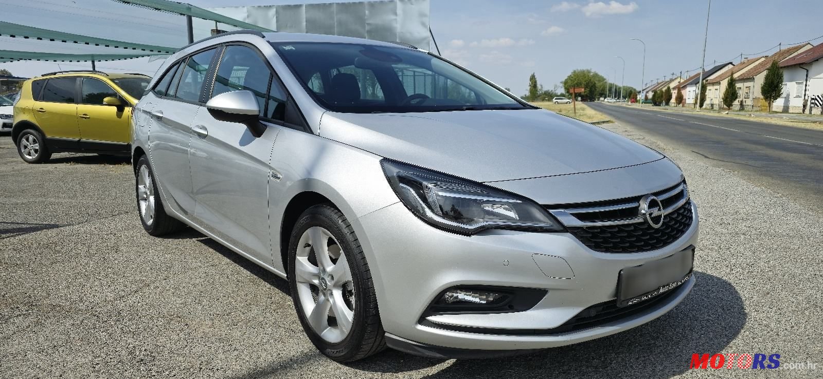 2016' Opel Astra Karavan photo #3
