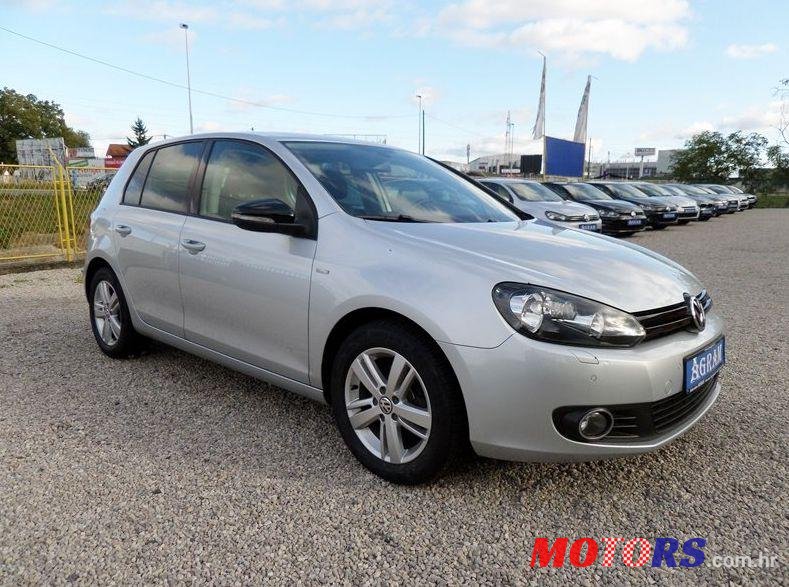 2012' Volkswagen Golf VI 1,6 Tdi photo #1