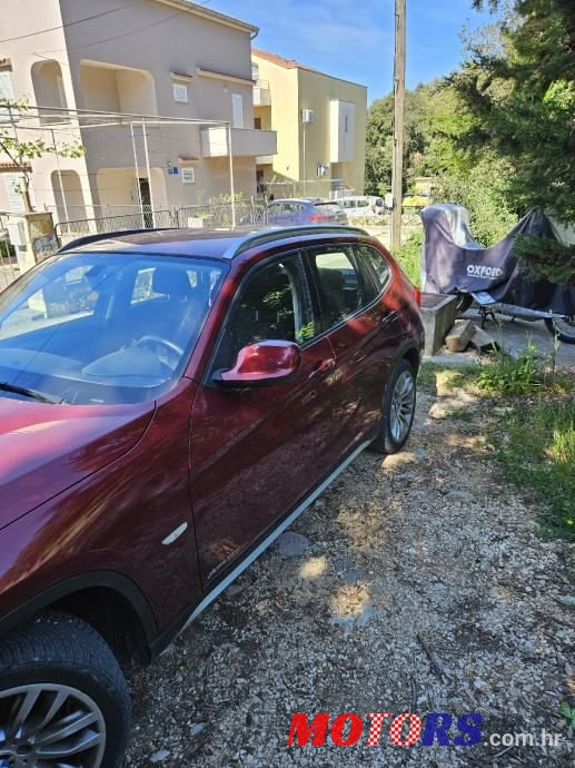 2011' BMW X1 Xdrive18D photo #6