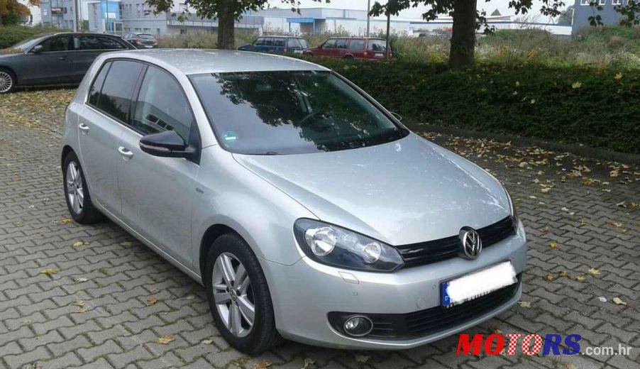 2012' Volkswagen Golf VI 1,6 Tdi photo #2