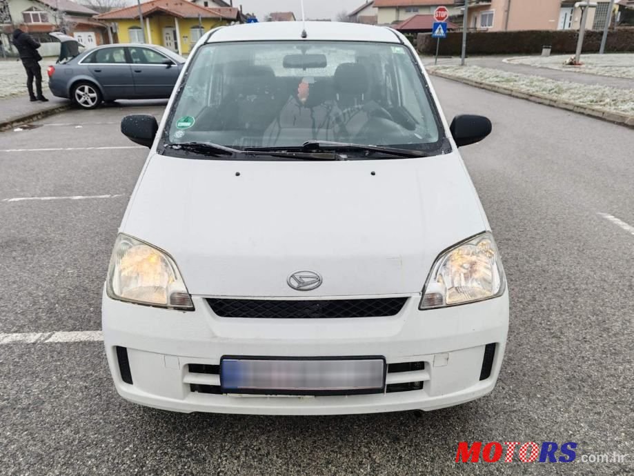2004' Daihatsu Cuore Pur photo #2