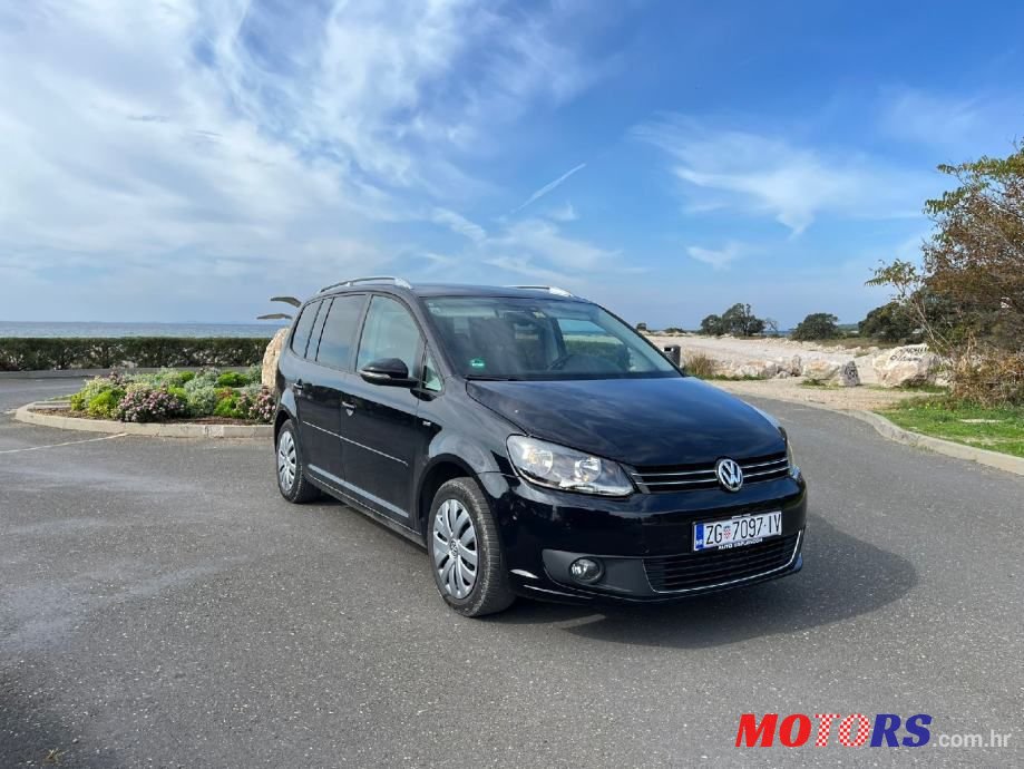 2014' Volkswagen Touran photo #1