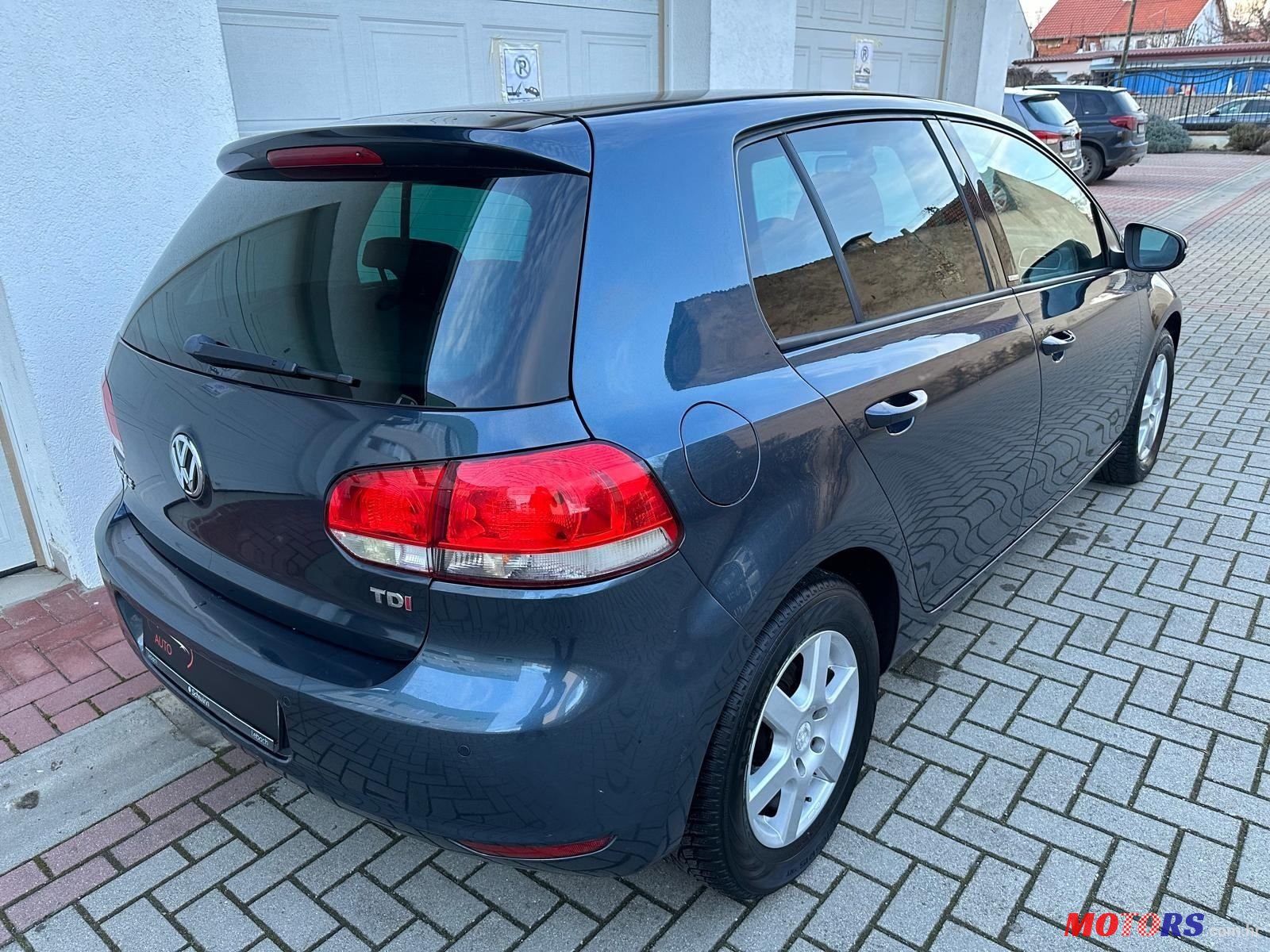 2012' Volkswagen Golf VI 1,6 Tdi photo #6