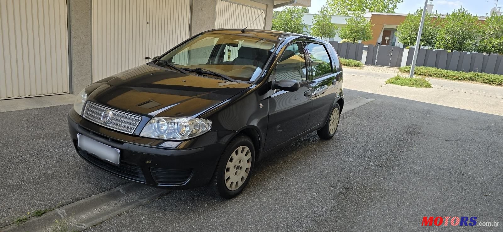 2009' Fiat Punto 1,2 photo #1