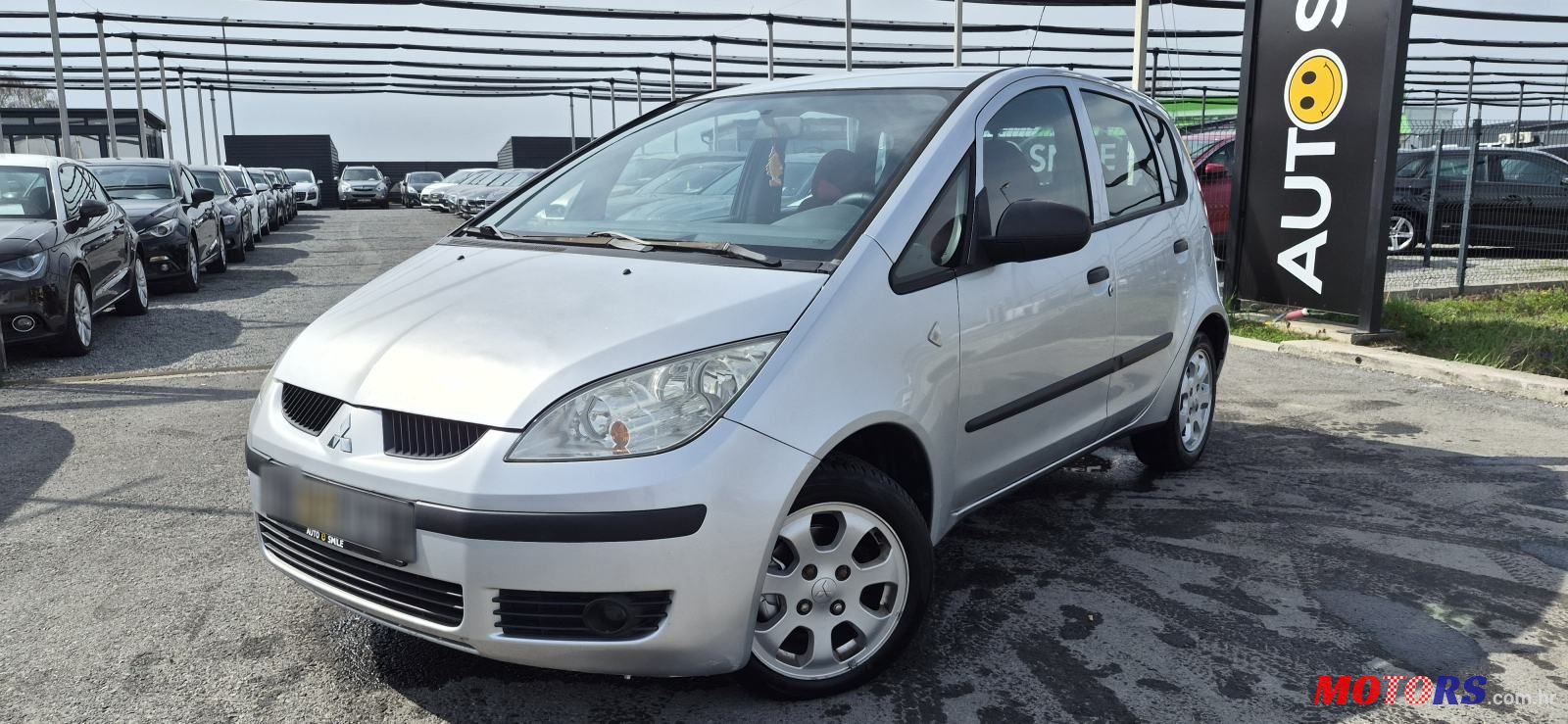 2004' Mitsubishi Colt 1,3 photo #1