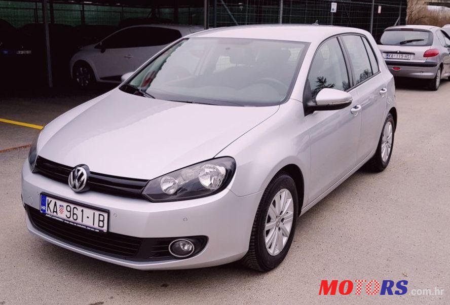 2012' Volkswagen Golf VI 1,6 Tdi photo #1