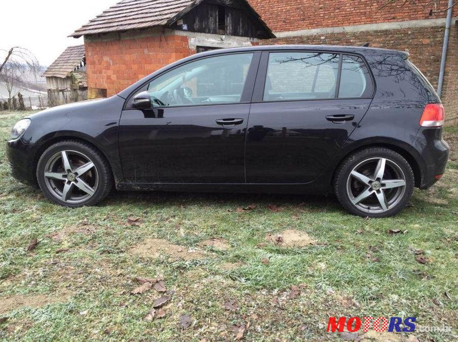 2011' Volkswagen Golf VI 1,6 Tdi photo #2