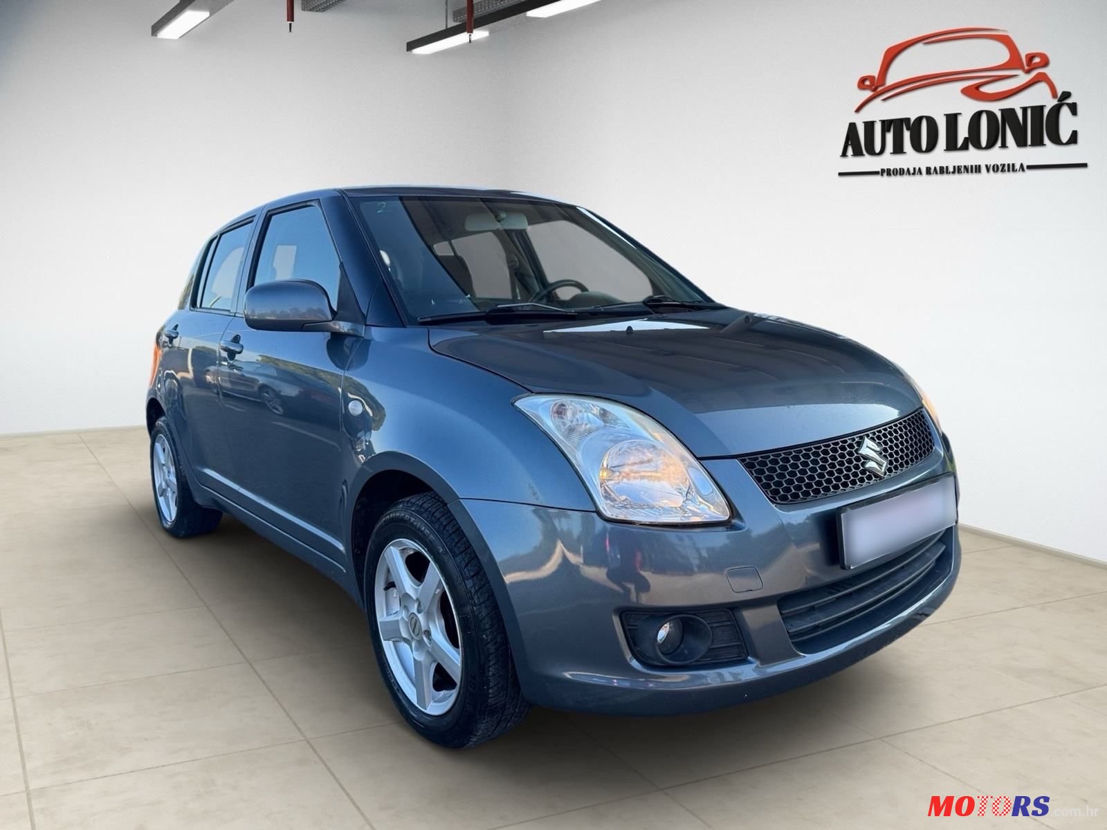 2009' Suzuki Swift 1,3 Gs photo #3