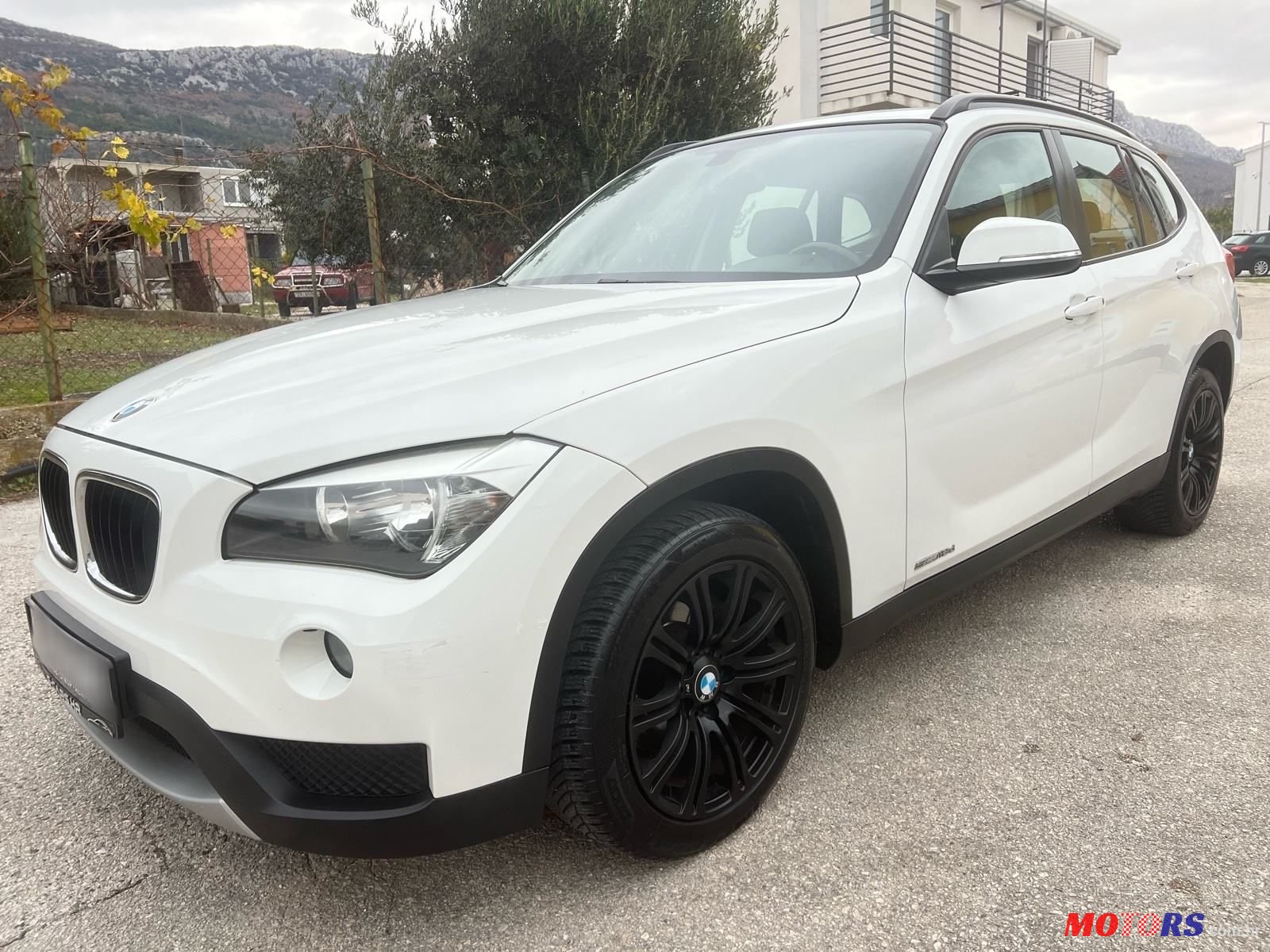 2014' BMW X1 Sdrive18D photo #4