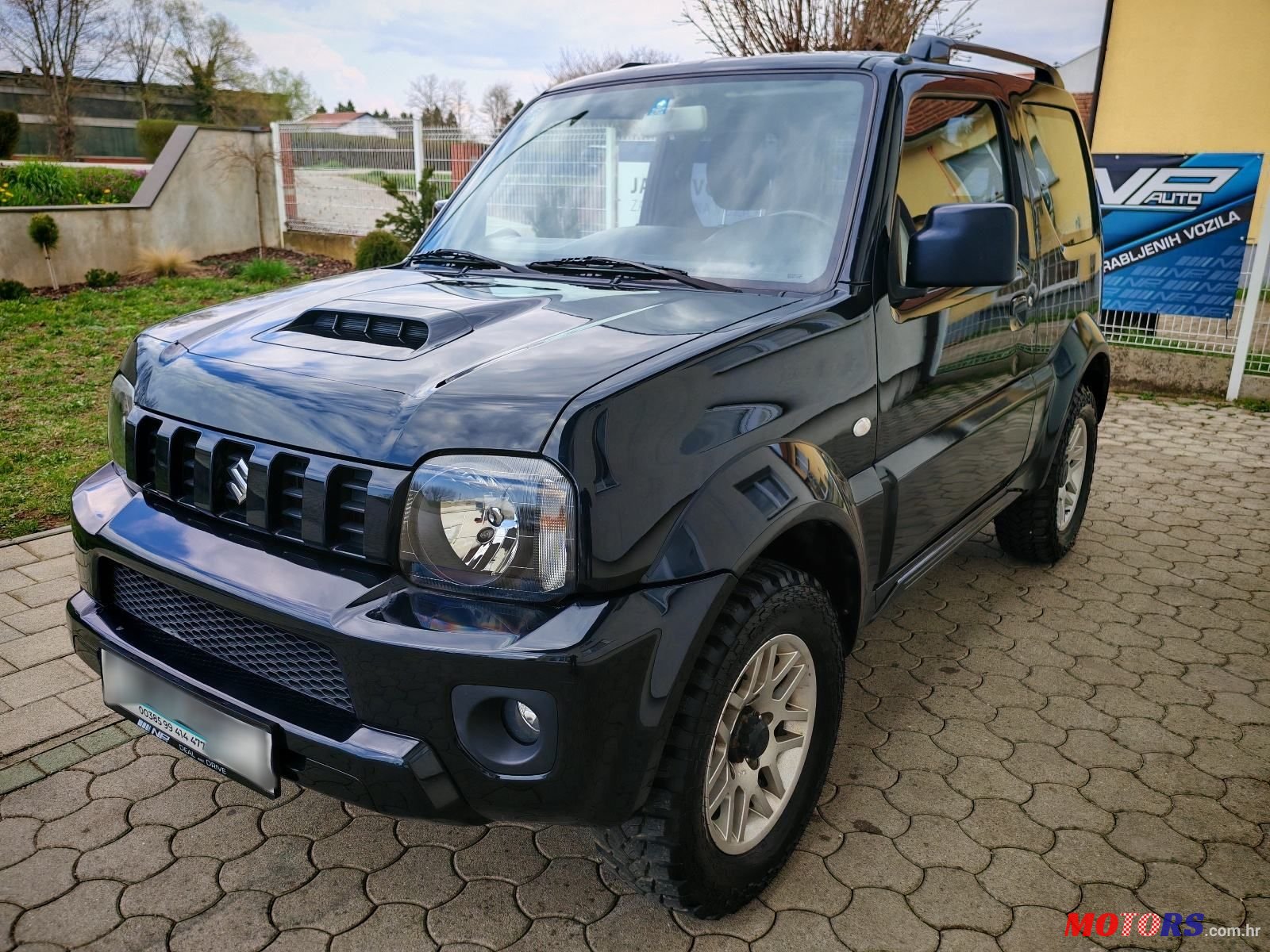 2006' Suzuki Jimny photo #1