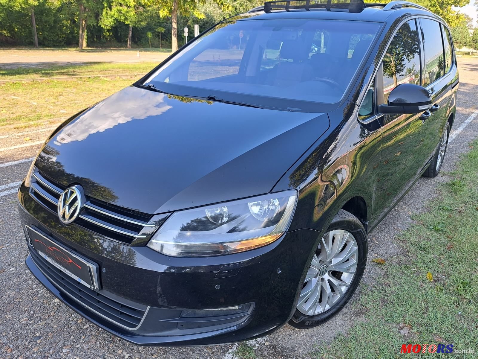 2011' Volkswagen Sharan 2,0 Tdi Bmt photo #1
