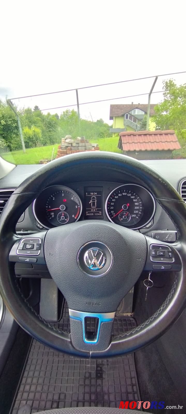 2012' Volkswagen Golf VI Variant photo #4