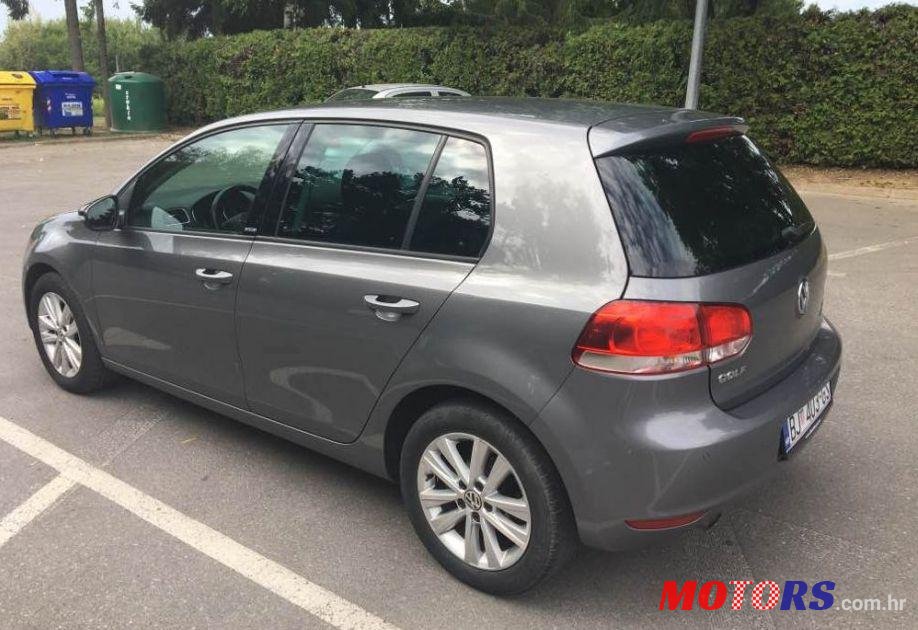 2011' Volkswagen Golf VI 1,6 Tdi photo #2