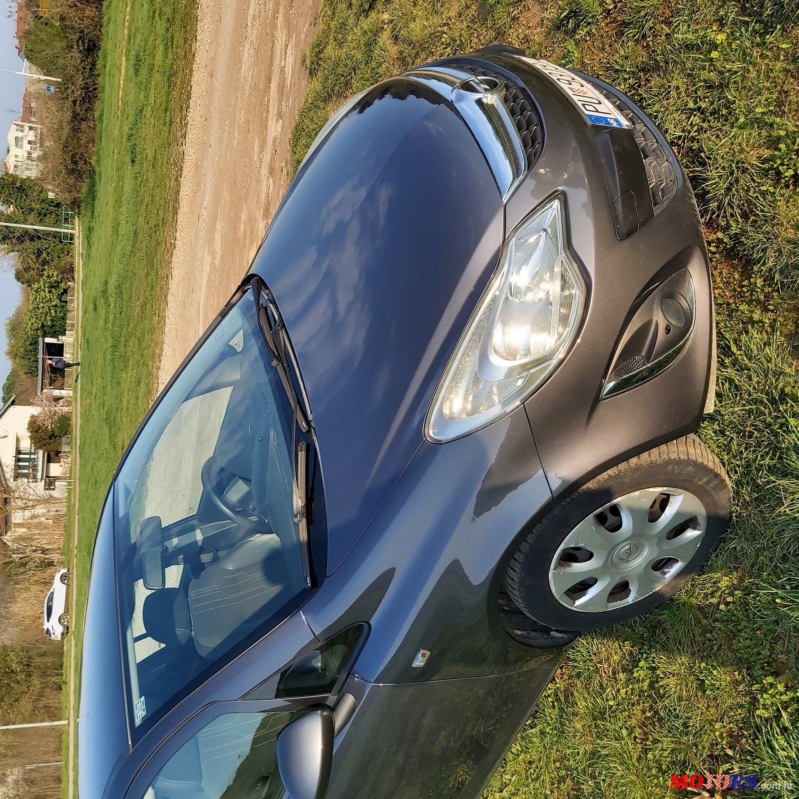 2012' Opel Corsa photo #3