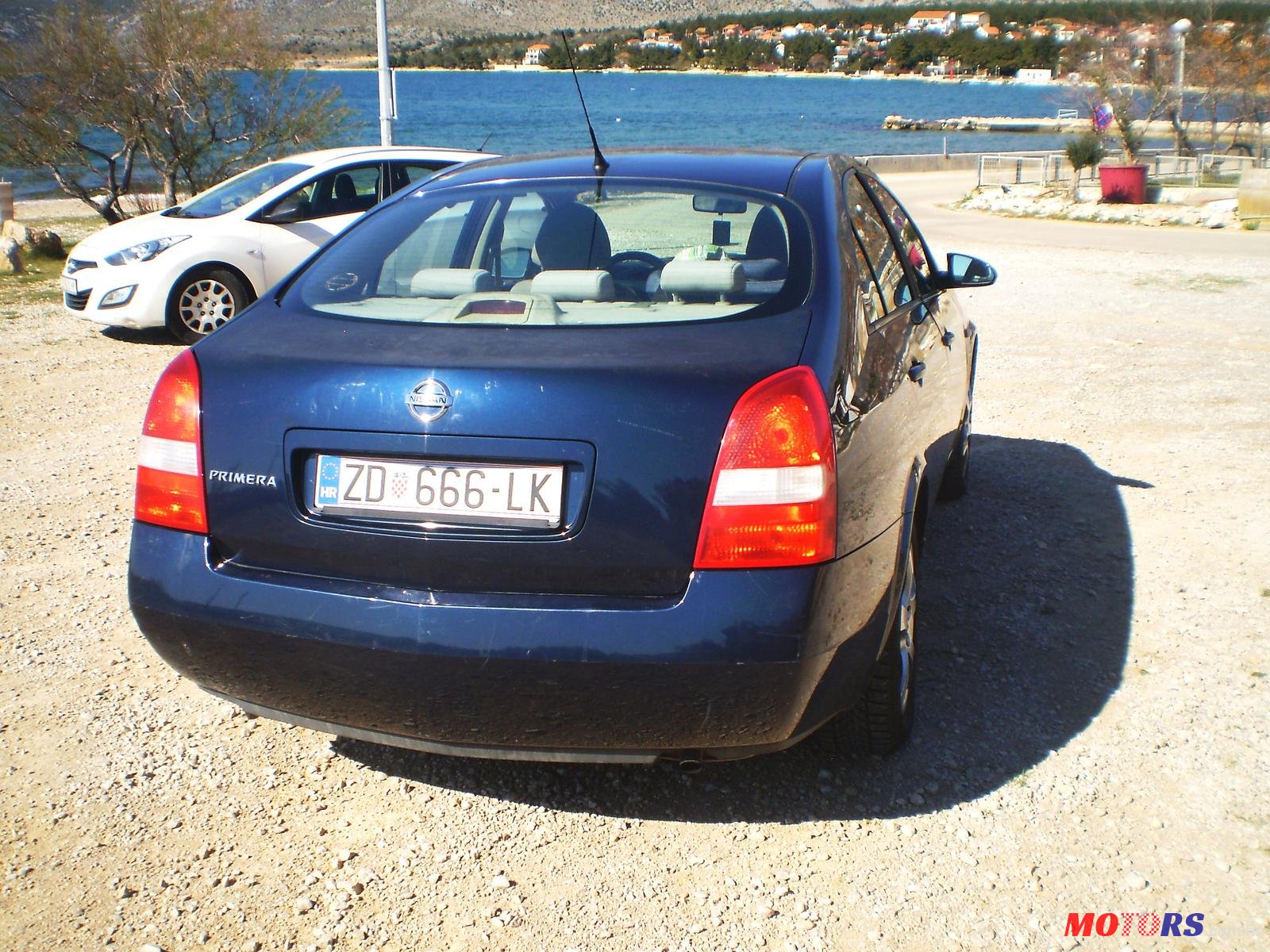 2004' Nissan Primera photo #3
