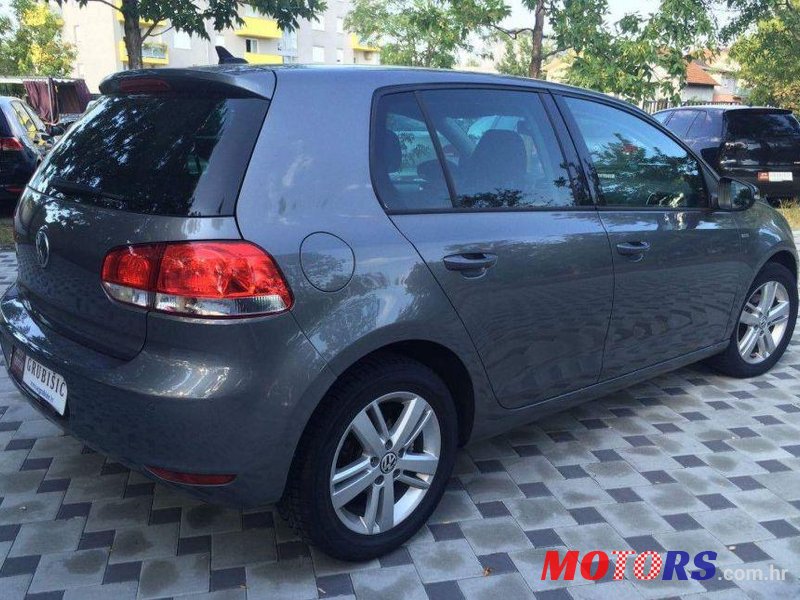 2012' Volkswagen Golf VI 1,6 Tdi photo #2