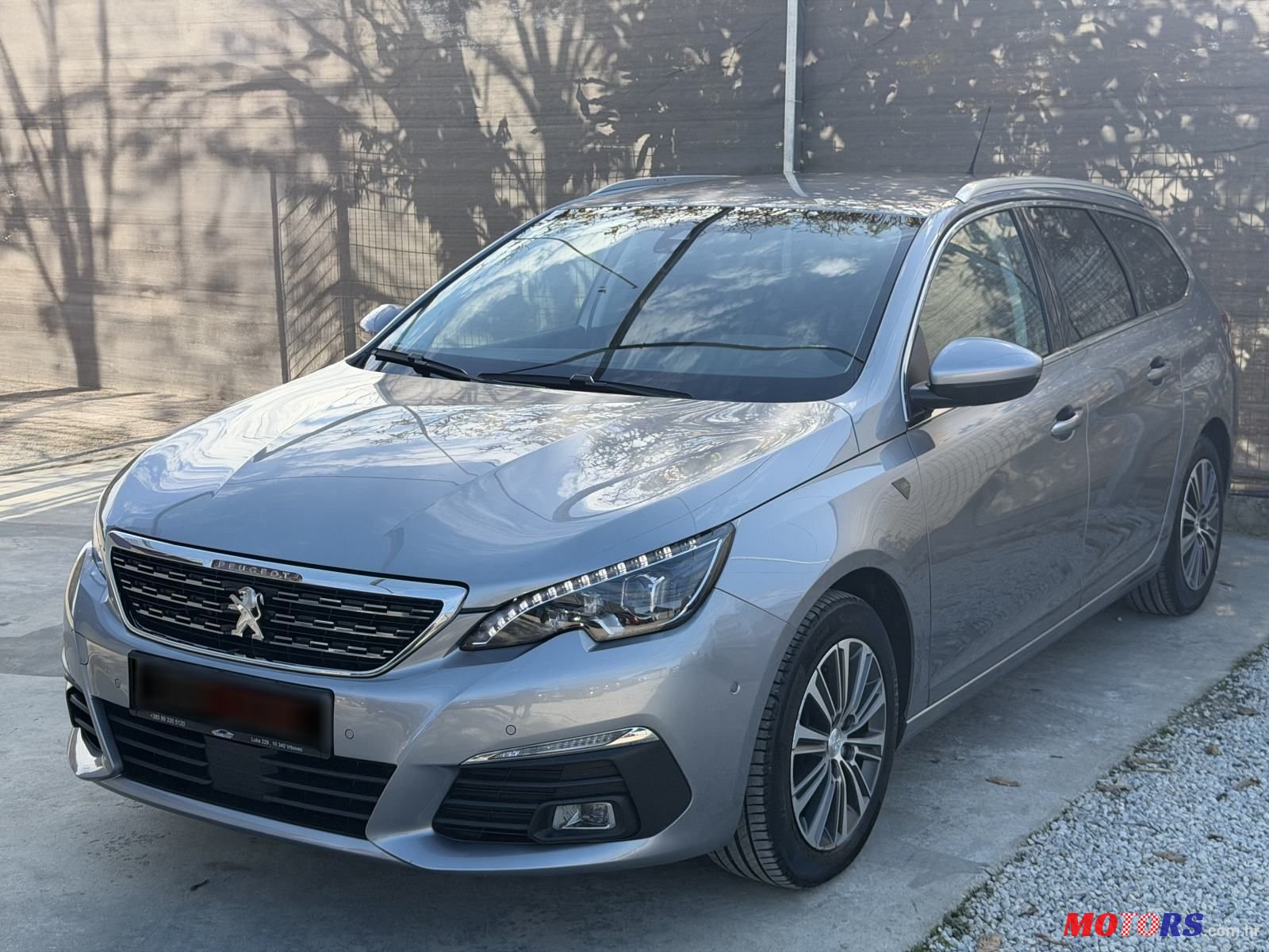 2021' Peugeot 308 Sw photo #1